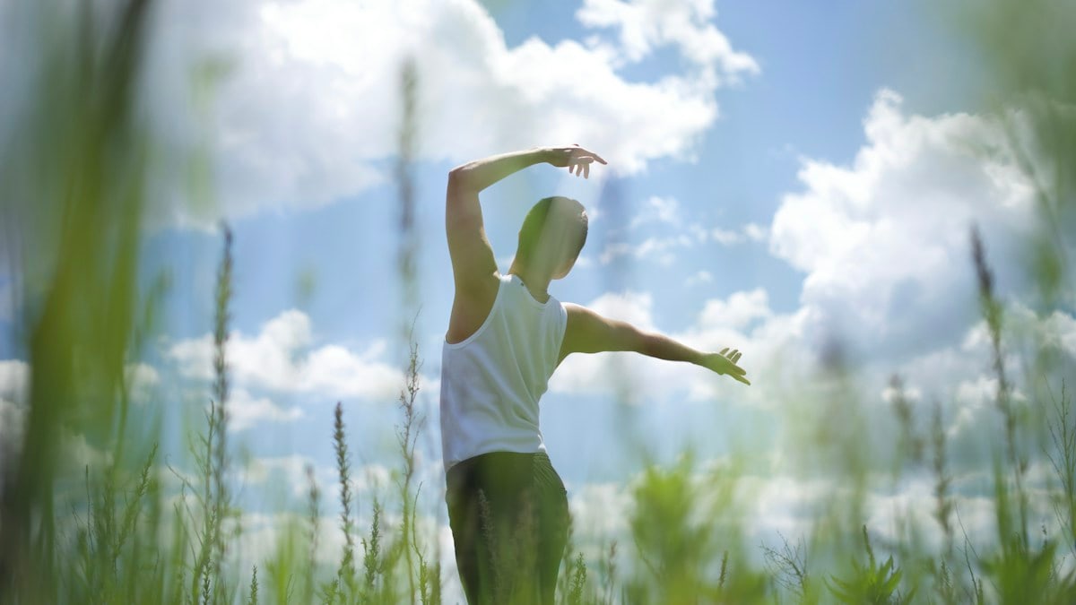 a man standing in a field